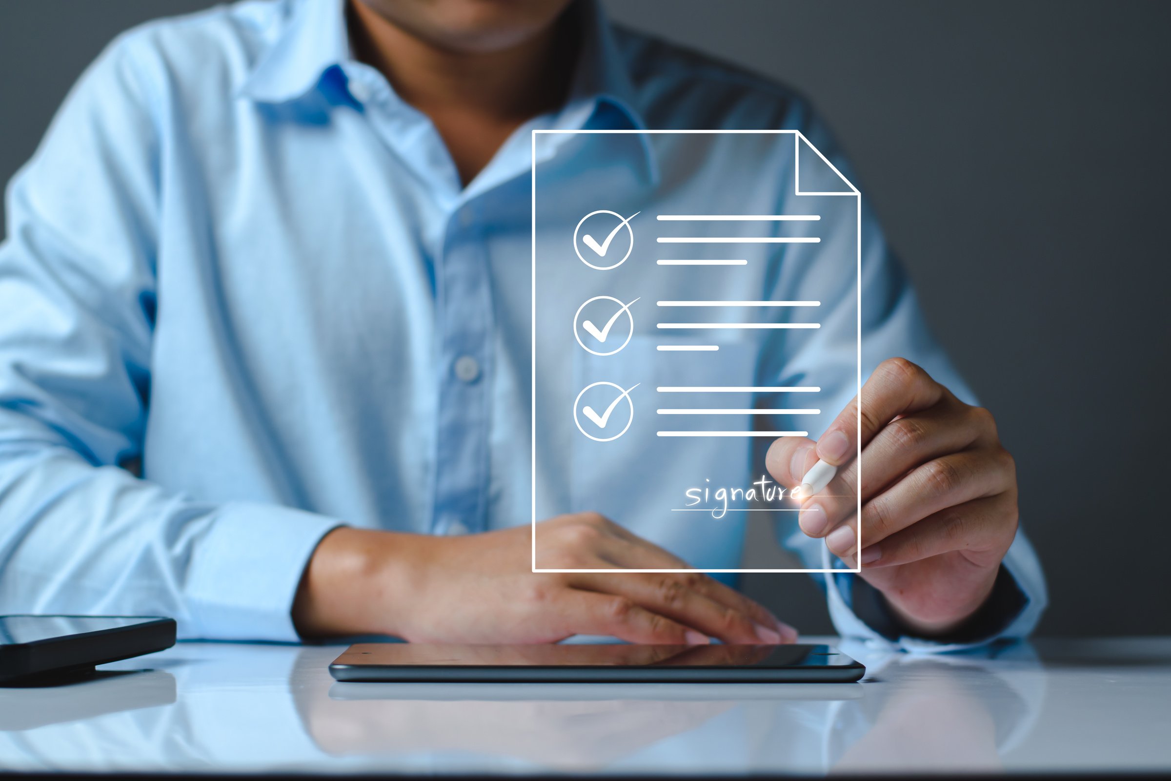 Electronic signature business concept. Manager is electronic sign an agreement on tablet, business approved, executing plan, project approved. digital signature. electronic document, digital business